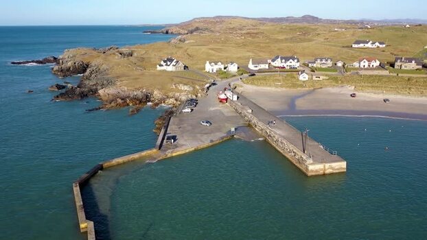 Aerial view of Portnablagh harbor and pier Ireland.