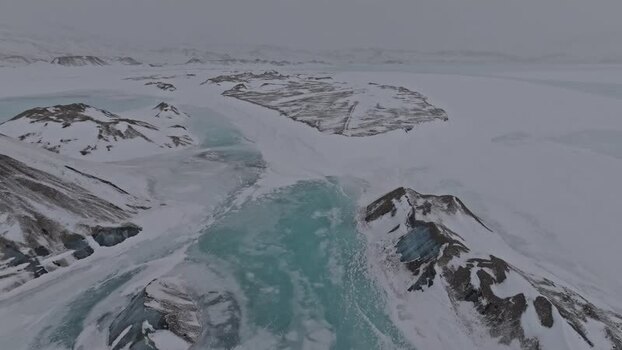 Aerial view of the icy landscape near Pyramiden Svalbard and Jan Mayen.