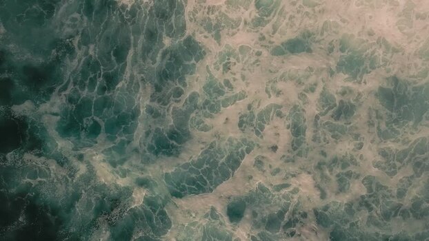 Aerial view of churning ocean waves at La Jolla Cove United States.