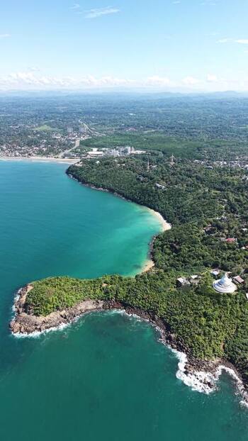 Aerial view of Jungle Beach and the Japanese Peace Pagoda Sri Lanka.
