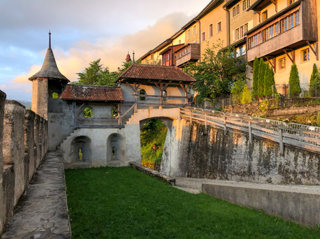Lucerne Switzerland 14 May 2026 View of the historic Musegg Wall with its stone fortifications wooden gatehouse and traditional buildings under a golden sunset sky. Lucerne Switzerland 14 May 2026 View of the historic Musegg Wall with its stone fortifications wooden gatehouse and traditional buildings under a golden sunset sky.