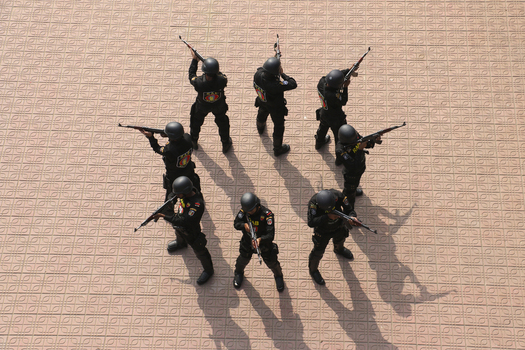 Dhaka Bangladesh 06 January 2017 View of Rapid Action Battalion officers in black uniforms holding rifles during a training exercise at the RAB Headquarters. Dhaka Bangladesh 06 January 2017 View of Rapid Action Battalion officers in black uniforms holding rifles during a training exercise at the RAB Headquarters.