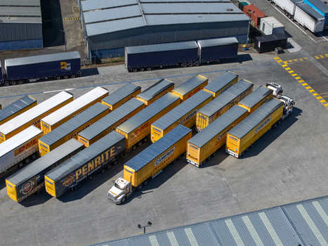 Kilsyth Australia 20 September 2026 Aerial view of a logistics yard filled with parked semi trailers and trucks showcasing industrial transport infrastructure. Kilsyth Australia 20 September 2026 Aerial view of a logistics yard filled with parked semi trailers and trucks showcasing industrial transport infrastructure.