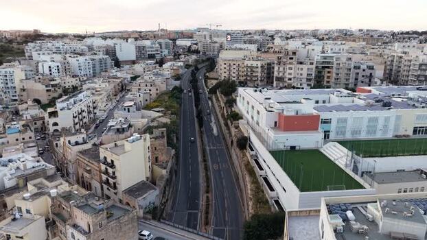 Aerial view of urban buildings and a highway in Msida Malta. Aerial view of urban buildings and a highway in Msida Malta.