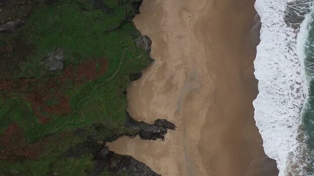 Aerial view of the rugged cliffs and sandy beach in Loiba Spain. Aerial view of the rugged cliffs and sandy beach in Loiba Spain.