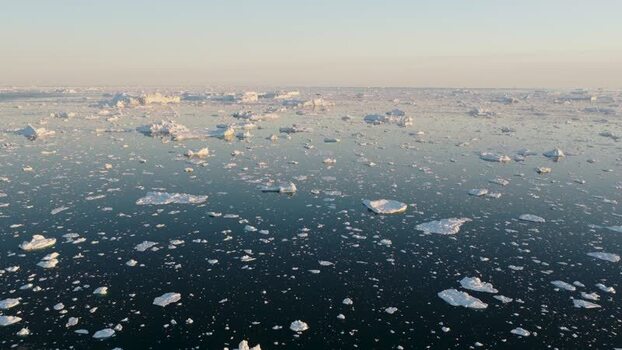 Aerial view of Ilulissat icebergs in the sea Greenland. Aerial view of Ilulissat icebergs in the sea Greenland.