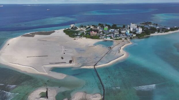Aerial view of Gulhi island and turquoise lagoons Maldives. Aerial view of Gulhi island and turquoise lagoons Maldives.