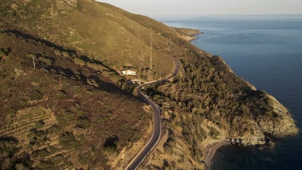 Aerial View of a road along the coast Pomonte Elba Island Tuscany Italy.