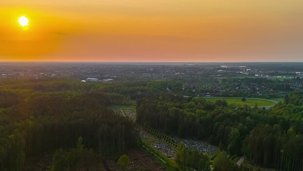Aerial view of sunset over the forests and fields of Latvia. Aerial view of sunset over the forests and fields of Latvia.