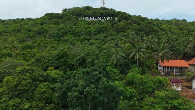 Aerial view of Karimunjawa sign on hill Indonesia. Aerial view of Karimunjawa sign on hill Indonesia.