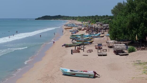 Aerial view of fishing boats on Trincomalee beach Sri Lanka.