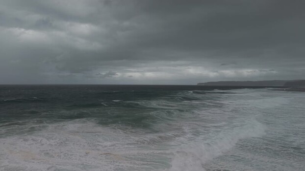 Aerial view of coastline with waves Australia.
