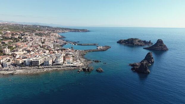 Aerial view of the Islands of the Cyclops and Aci Castello Italy.