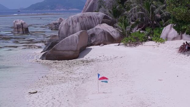 Aerial view of Anse Reunion beach with granite boulders Seychelles.
