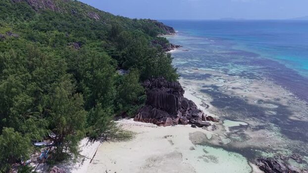 Aerial view of Curieuse coastline Seychelles.