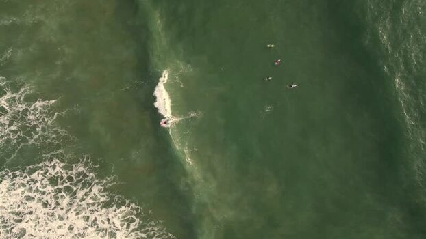 Aerial view of surfers at Praia da Mata Portugal. Aerial view of surfers at Praia da Mata Portugal.