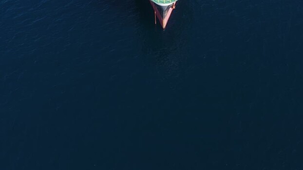 Aerial view of a large ship bow in deep blue water Maldives.