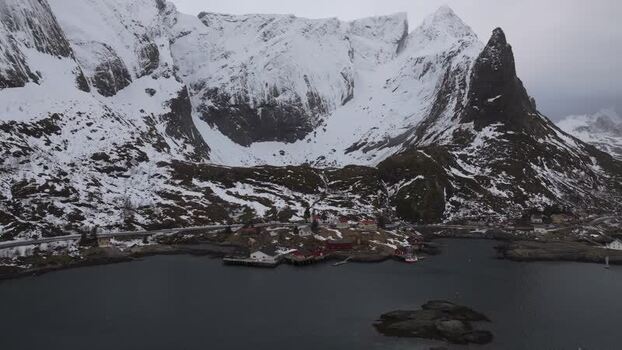 Aerial view of Lofoten mountains and village in Norway.