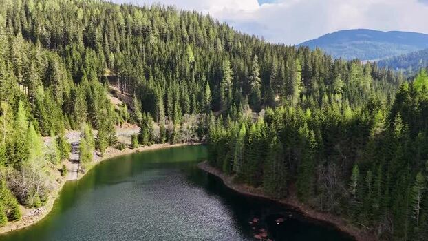 Aerial view of Sperre Paal dam area and lush green forests Austria. Aerial view of Sperre Paal dam area and lush green forests Austria.