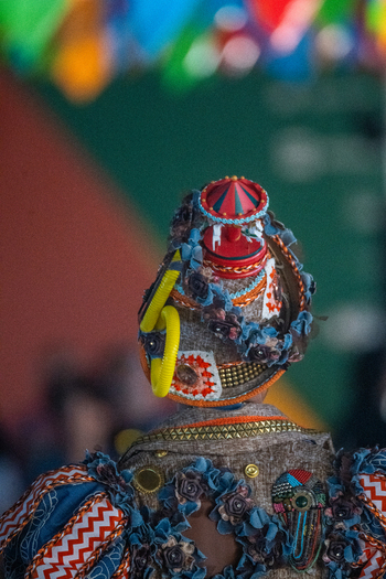 Rio de Janeiro Brazil 20 June 2026 View of a person in an elaborate colorful costume with a decorative hat featuring a miniature carousel and floral accents during the Festa Junina celebration. Rio de Janeiro Brazil 20 June 2026 View of a person in an elaborate colorful costume with a decorative hat featuring a miniature carousel and floral accents during the Festa Junina celebration.