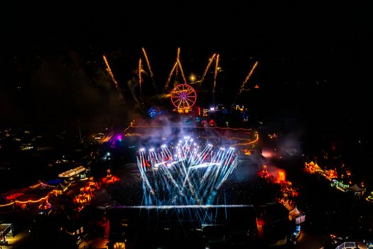 Herzogenaurach Germany 27 July 2025 Aerial view of the Open Beatz Festival featuring fireworks a Ferris wheel and vibrant stage lights illuminating the crowd at night. Herzogenaurach Germany 27 July 2025 Aerial view of the Open Beatz Festival featuring fireworks a Ferris wheel and vibrant stage lights illuminating the crowd at night.