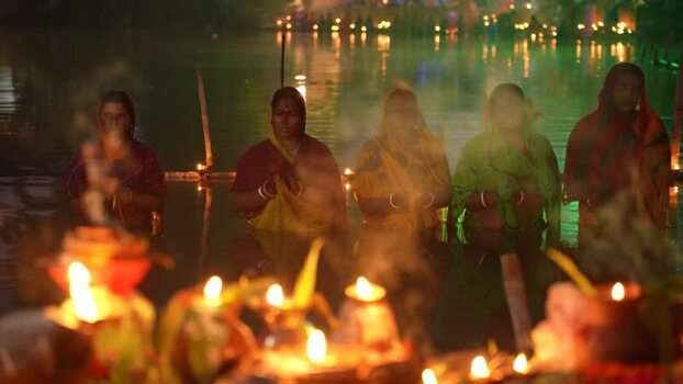 View of women performing a religious ritual with candles Bangladesh. View of women performing a religious ritual with candles Bangladesh.