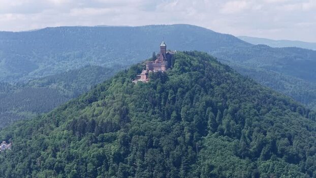 Aerial view of Haut Koenigsbourg Castle on a forested hill France.