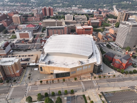 Pittsburgh Pennsylvania United States 26 July 2026 Aerial view of PPG Paints Arena surrounded by urban buildings streets and parking lots in the city center.