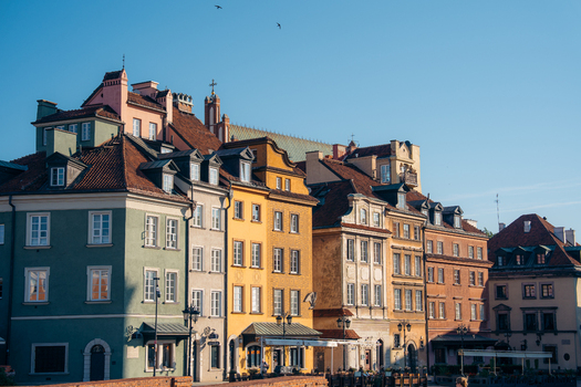 View of Warsaw Old Town with its colorful historic buildings under a clear blue sky in Warsaw Masovian Voivodeship Poland. View of Warsaw Old Town with its colorful historic buildings under a clear blue sky in Warsaw Masovian Voivodeship Poland.