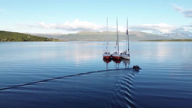 Aerial view of sailboats in the Senja fjord Norway. Aerial view of sailboats in the Senja fjord Norway.