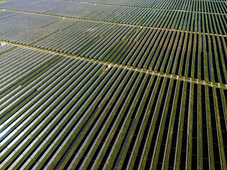 Aerial view of Limondale Solar Farm with rows of photovoltaic panels arranged in a vast field in Balranald New South Wales Australia. Aerial view of Limondale Solar Farm with rows of photovoltaic panels arranged in a vast field in Balranald New South Wales Australia.