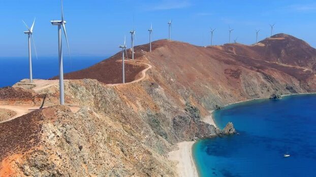 Aerial view of wind turbines on a coastal ridge Greece. Aerial view of wind turbines on a coastal ridge Greece.
