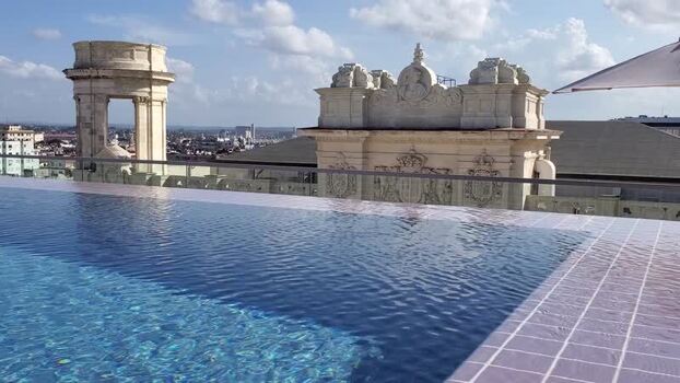 View of infinity pool overlooking historic Old Havana Cuba.