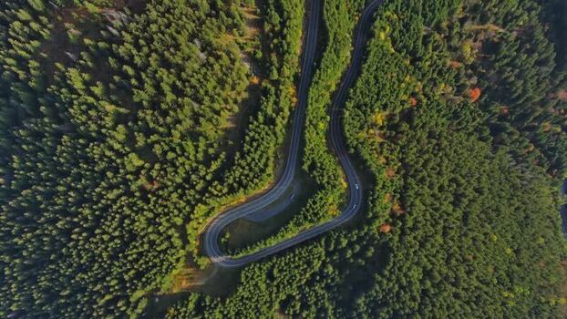Aerial view of winding road in Transylvania Romania.