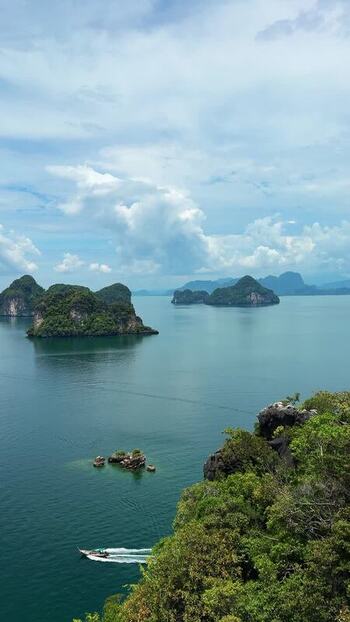 View of limestone karsts in the sea Thailand.