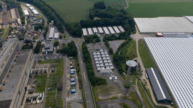Aerial view of Battery Energy Storage Park Beside Traditional Power Plant Aerial view of Battery Energy Storage Park Beside Traditional Power Plant