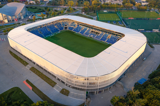 Plock Masovian Voivodeship Poland 10 September 2026 Aerial view of ORLEN Stadion im. Kazimierza Gorskiego featuring blue seating a green pitch and modern white roof structure.