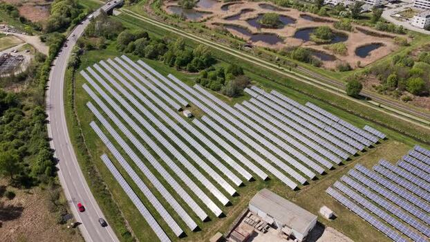 Aerial view of solar farm panels and wetlands Czechia. Aerial view of solar farm panels and wetlands Czechia.