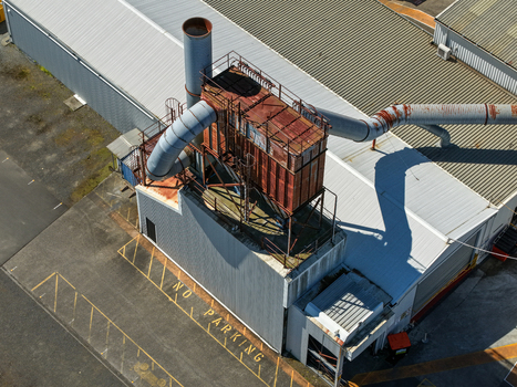 Kilsyth Victoria Australia 20 September 2026 Aerial view of an industrial factory site featuring large rusted machinery ventilation ducts and metal rooftops in an urban area. Kilsyth Victoria Australia 20 September 2026 Aerial view of an industrial factory site featuring large rusted machinery ventilation ducts and metal rooftops in an urban area.