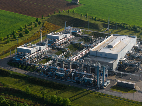 Aerial view of the UGS Damborice underground gas storage facility with complex industrial piping and infrastructure surrounded by green fields in Damborice South Moravian Region Czechia. Aerial view of the UGS Damborice underground gas storage facility with complex industrial piping and infrastructure surrounded by green fields in Damborice South Moravian Region Czechia.