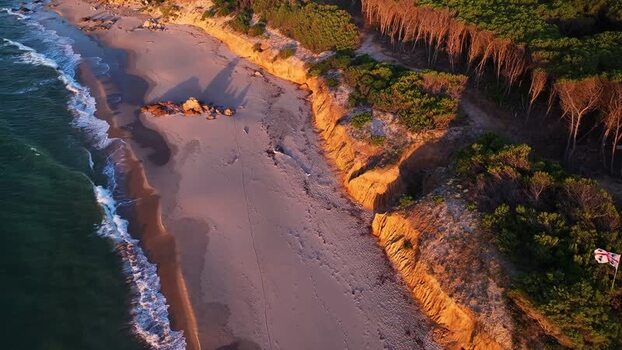 Aerial view of the rugged coastline and beach at Costa Paradiso Italy. Aerial view of the rugged coastline and beach at Costa Paradiso Italy.