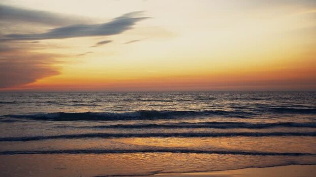 View of gentle waves at sunset on Cox s Bazar beach Bangladesh. View of gentle waves at sunset on Cox s Bazar beach Bangladesh.