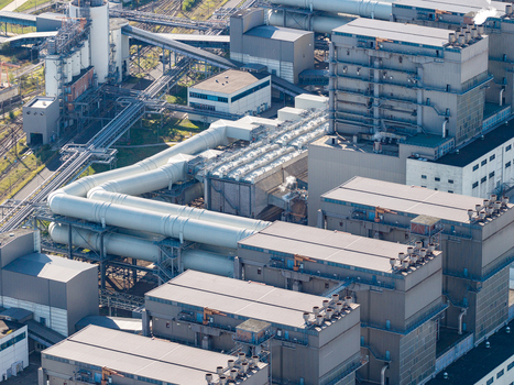 Aerial view of Janschwalde Power Station featuring industrial infrastructure with large pipes and cooling systems in Peitz Brandenburg Germany. Aerial view of Janschwalde Power Station featuring industrial infrastructure with large pipes and cooling systems in Peitz Brandenburg Germany.