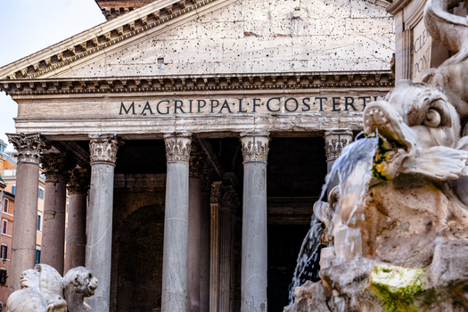 View of the Pantheon facade with its ancient Corinthian columns and the Fontana del Pantheon sculpture in the foreground Rome Lazio Italy. View of the Pantheon facade with its ancient Corinthian columns and the Fontana del Pantheon sculpture in the foreground Rome Lazio Italy.