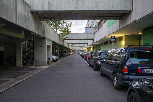 Aerial view of the High Deck Siedlung residential complex with concrete walkways and parked cars in Berlin Berlin Germany. Aerial view of the High Deck Siedlung residential complex with concrete walkways and parked cars in Berlin Berlin Germany.