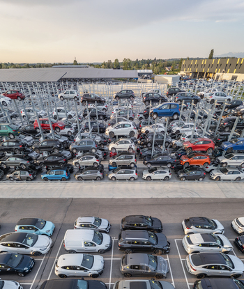 Livron sur Drome France 20 June 2026 Aerial view of an automated car storage facility with multi level racks holding numerous vehicles with a paved parking lot in the foreground. Livron sur Drome France 20 June 2026 Aerial view of an automated car storage facility with multi level racks holding numerous vehicles with a paved parking lot in the foreground.