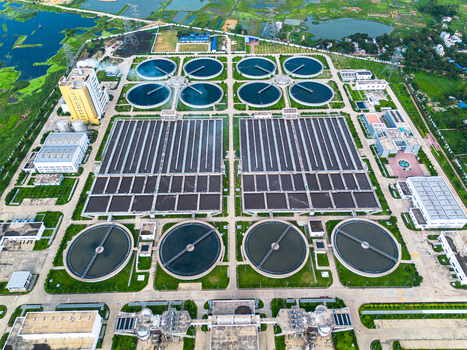 Aerial view of Sewage Treatment Plant Dhaka WASA showing circular clarifiers and rectangular filtration basins Dhaka Dhaka Division Bangladesh. Aerial view of Sewage Treatment Plant Dhaka WASA showing circular clarifiers and rectangular filtration basins Dhaka Dhaka Division Bangladesh.