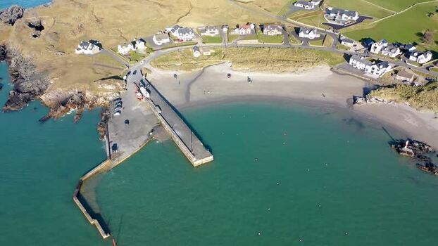Aerial view of Portnablagh harbour and beach Ireland.