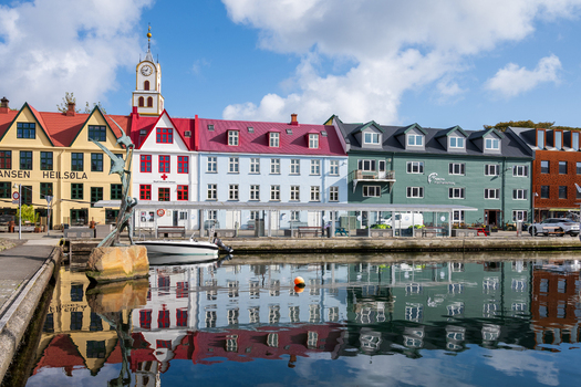 View of the colorful historic buildings along the harbor in Torshavn Faroe Islands. View of the colorful historic buildings along the harbor in Torshavn Faroe Islands.