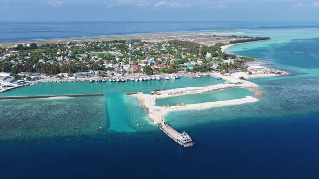Aerial view of the harbor and town of Kudahuvadhoo Maldives. Aerial view of the harbor and town of Kudahuvadhoo Maldives.
